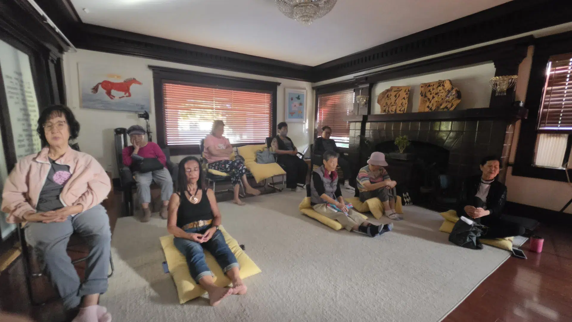 Seniors practicing seated meditation at Metime Mindful
